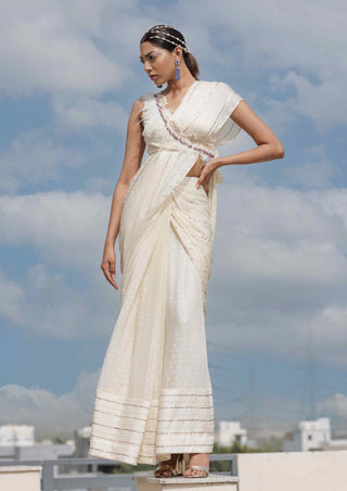 Beige chiffon stitched saree and blouse