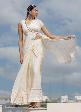 Beige chiffon stitched saree and blouse