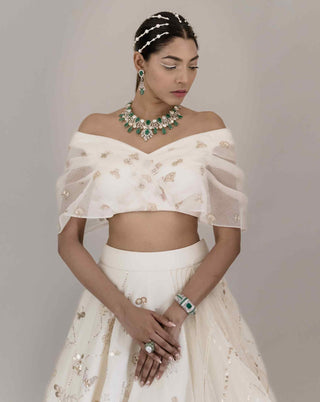 White multi-layered lehenga and blouse