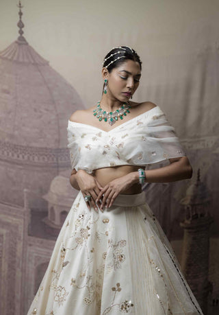 White multi-layered lehenga and blouse