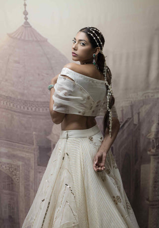 White multi-layered lehenga and blouse