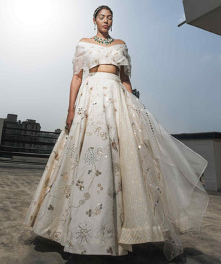 White multi-layered lehenga and blouse