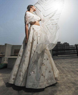 White multi-layered lehenga and blouse