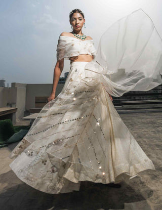 White multi-layered lehenga and blouse