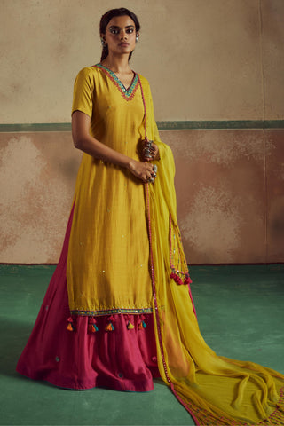 Backless yellow rang kurta skirt set