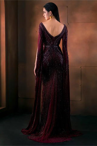 Burgundy embroidered gown with floor-length sleeves