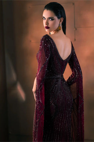 Burgundy embroidered gown with floor-length sleeves