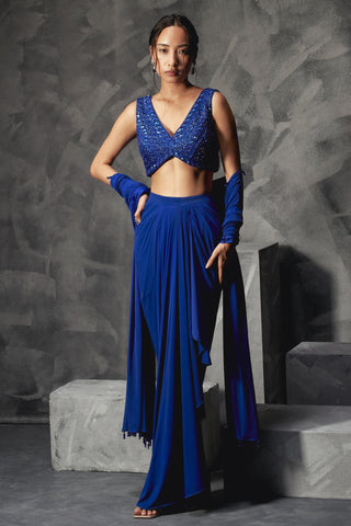 Blue rainfall drape reim skirt with low v cut blouse and dupatta