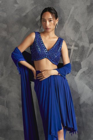 Blue rainfall drape reim skirt with low v cut blouse and dupatta