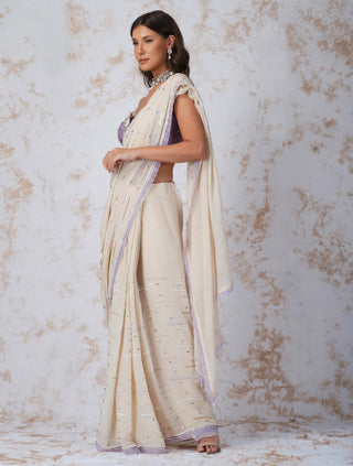 Sequined deep ivory saree and contrast blouse