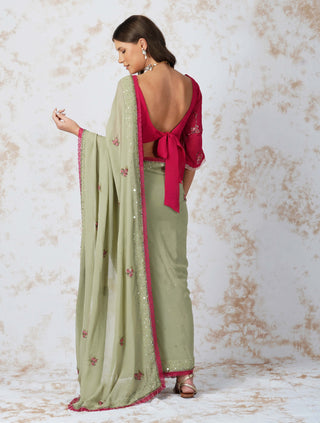 Beaded flower green saree and pink blouse