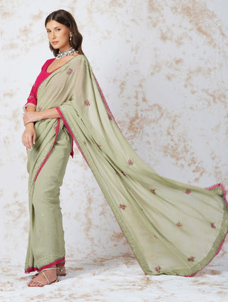 Beaded flower green saree and pink blouse