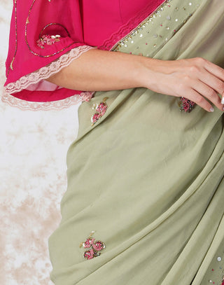 Beaded flower green saree and pink blouse