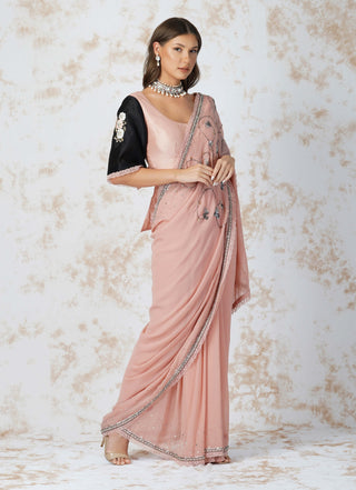 Antique work pink saree and contrast blouse