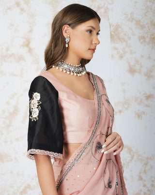 Antique work pink saree and contrast blouse