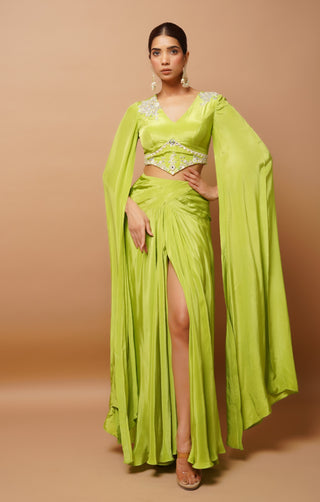 Bright green bustier and slit draped skirt