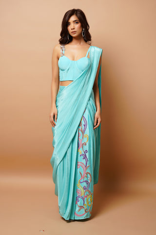 Firozi blue draped saree and blouse