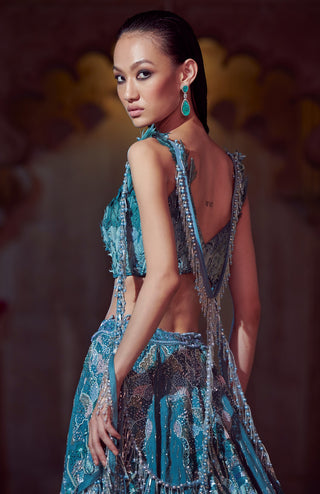 Blue silk lehenga and feather blouse