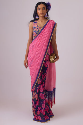 Pink georgette striped and rose printed saree with fringes detail paired with emb floral blouse