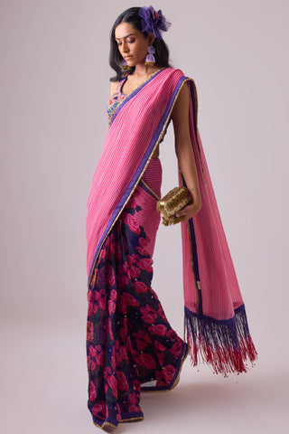 Pink georgette striped and rose printed saree with fringes detail paired with emb floral blouse