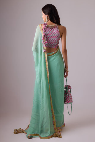 Green georgette saree with crepe blouse