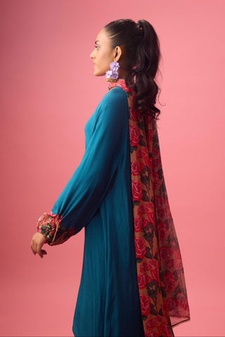 Blue solid crepe asymmetrical handwork kurta paired with printed sharara and dupatta