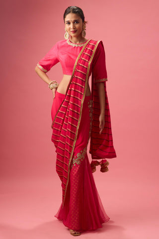 Pink double layer lehenga paired with blouse and dupatta