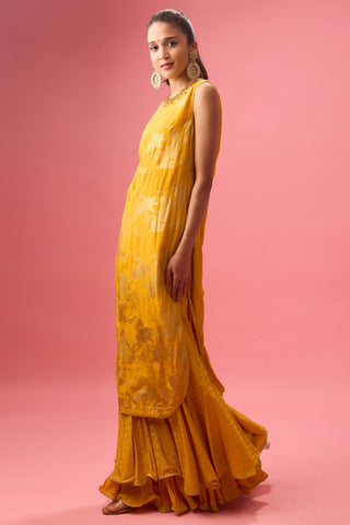 Yellow ochre sharara set with foil printing paired with hand emb dupatta