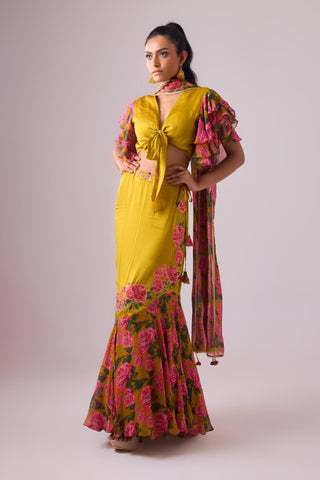 Yellow ochre lehenga with twist of frills and blouse with flared sleeves