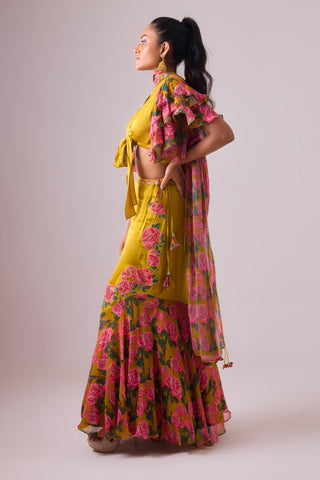 Yellow ochre lehenga with twist of frills and blouse with flared sleeves