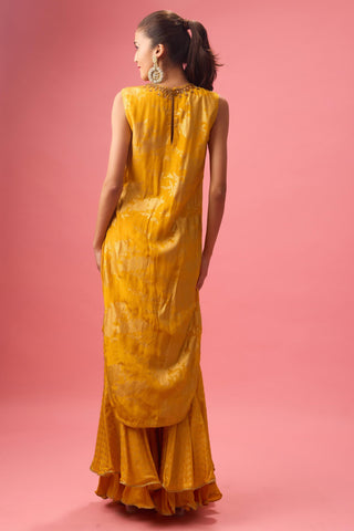 Yellow ochre sharara set with foil printing paired with hand emb dupatta