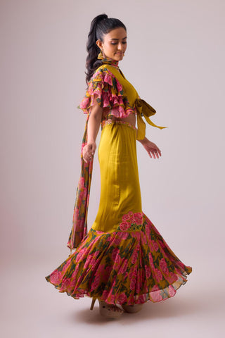 Yellow ochre lehenga with twist of frills and blouse with flared sleeves