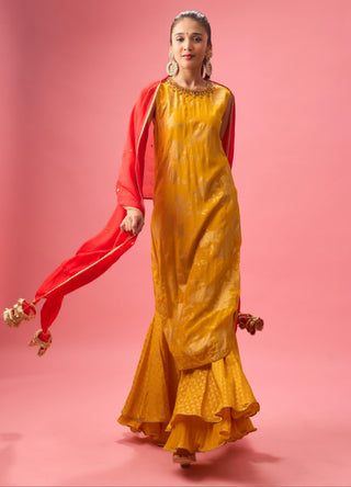 Yellow ochre sharara set with foil printing paired with hand emb dupatta