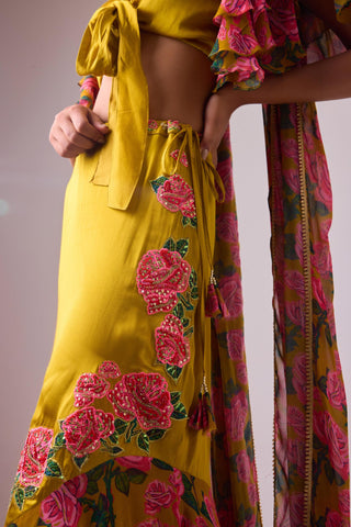 Yellow ochre lehenga with twist of frills and blouse with flared sleeves