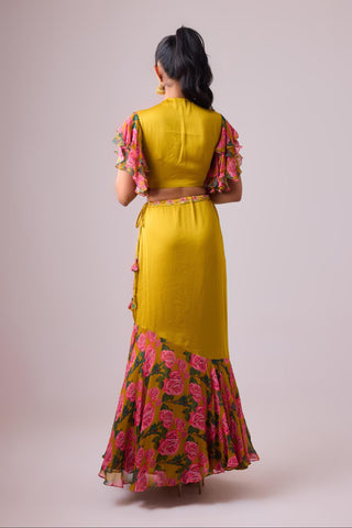 Yellow ochre lehenga with twist of frills and blouse with flared sleeves