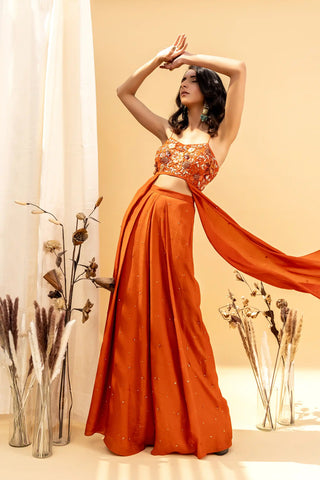 Rust orange draped blouse and pants