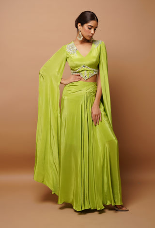 Bright green bustier and slit draped skirt