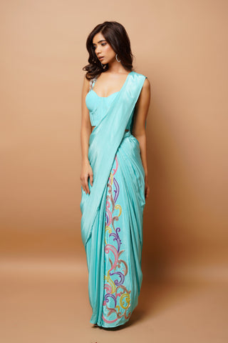 Firozi blue draped saree and blouse