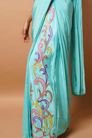 Firozi blue draped saree and blouse