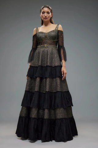 Black polylurex and net frilled gown