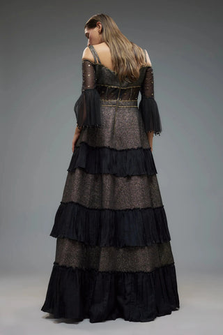 Black polylurex and net frilled gown