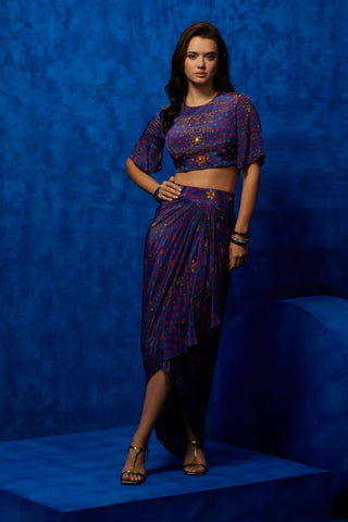 Purple dhoti skirt paired with crop top