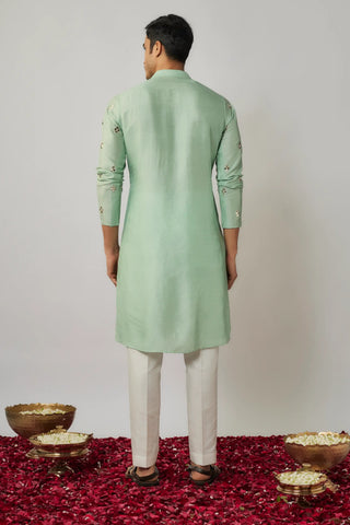 Mint dupion kurta with mirror embroidered buttis with ivory pants