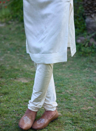 Ivory pleated kurta and churidaar