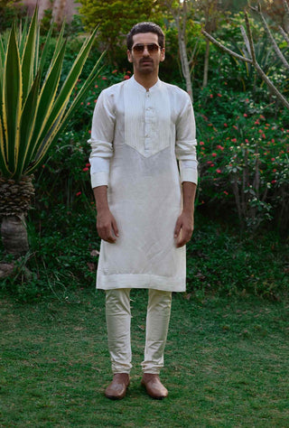 Ivory pleated kurta and churidaar