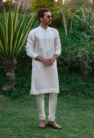 Ivory pleated kurta and churidaar