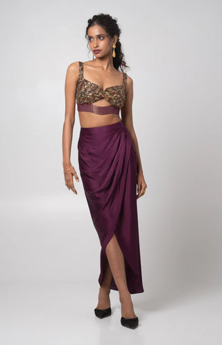 Purple hand embroidered bustier with printed cape and a draped skirt