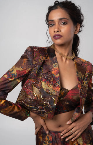 Multicolored cropped jacket with bustier and a draped skirt