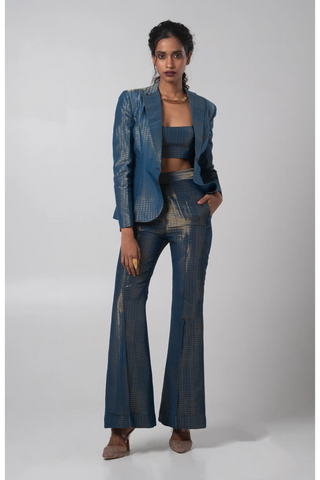 Blue organza blazer paired with a bustier and flared trouser