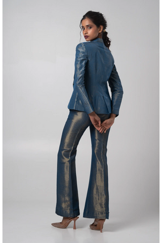 Blue organza blazer paired with a bustier and flared trouser